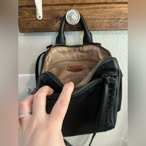 The Sak, black leather convertible “backpack” crossover purse.
